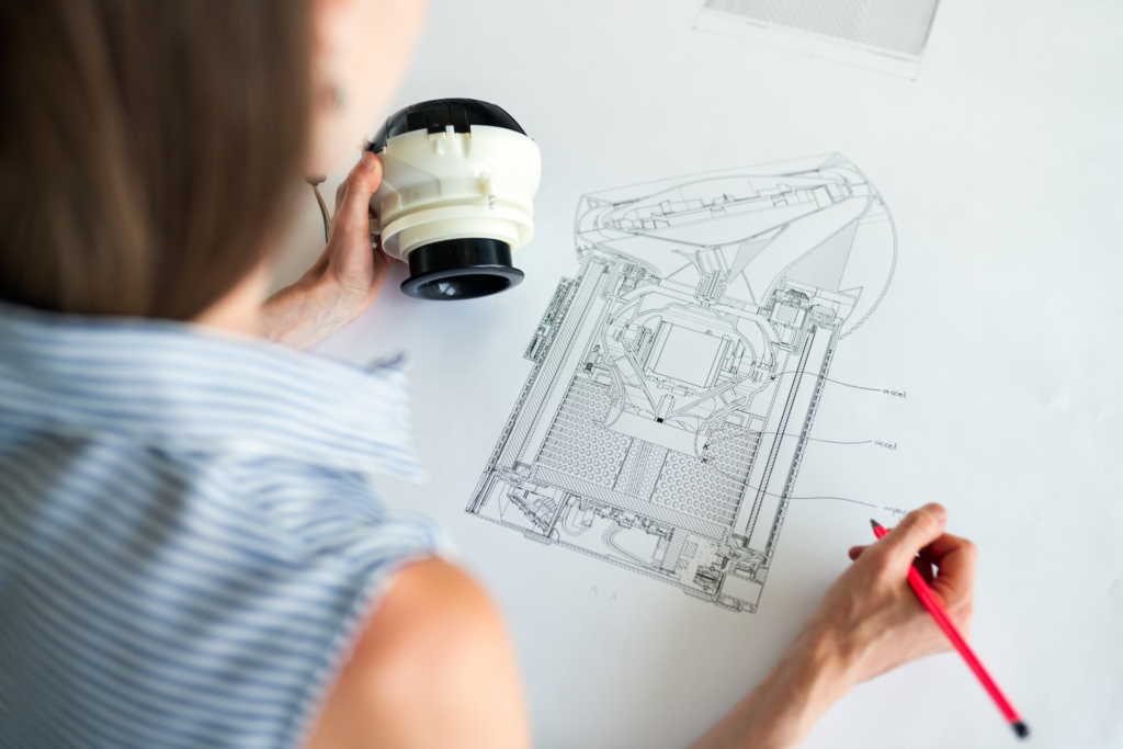 Electrical Engineers working on an air purification device
